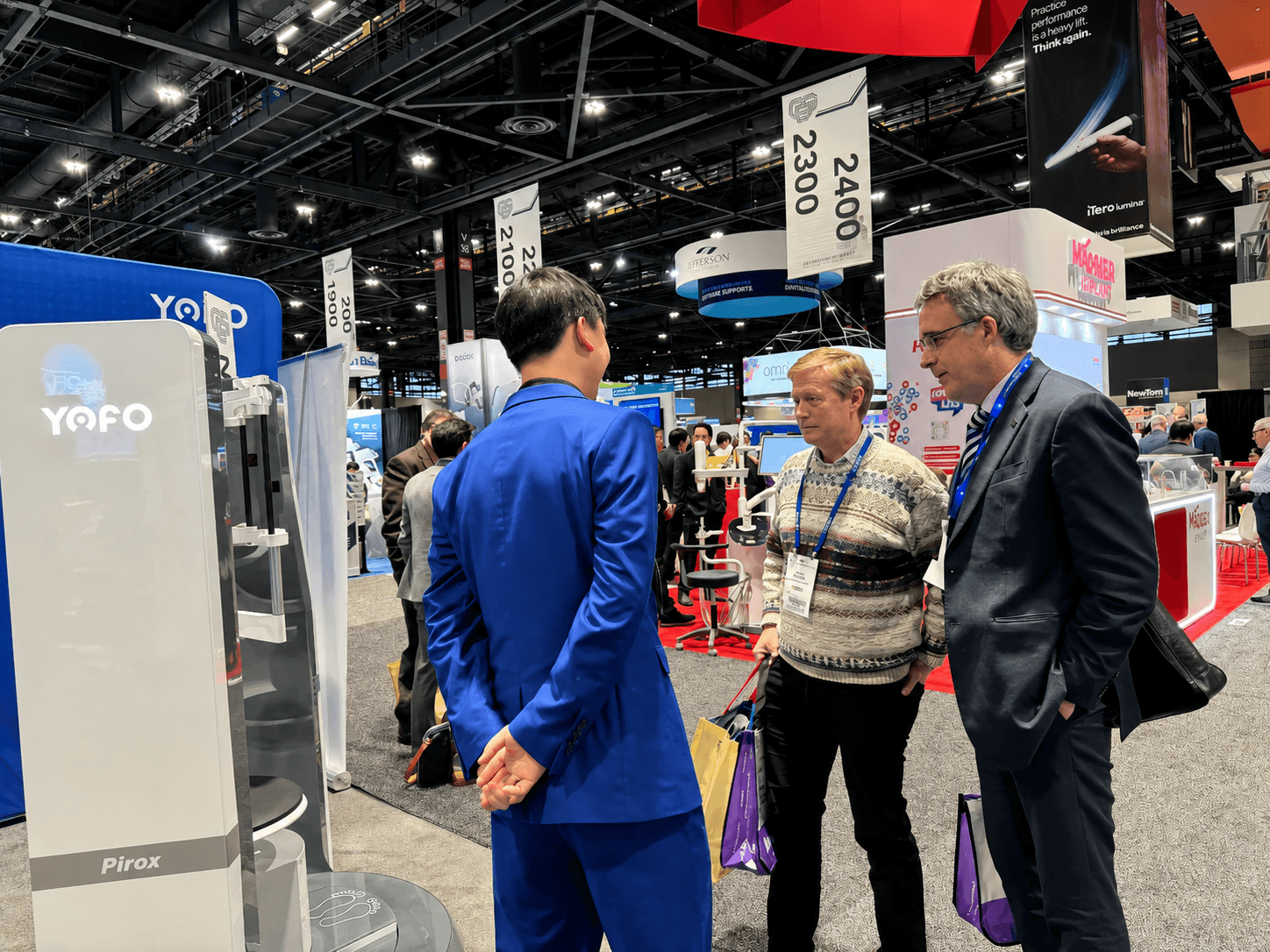 Visitors learning about Pirox-D Plus at the exhibition
