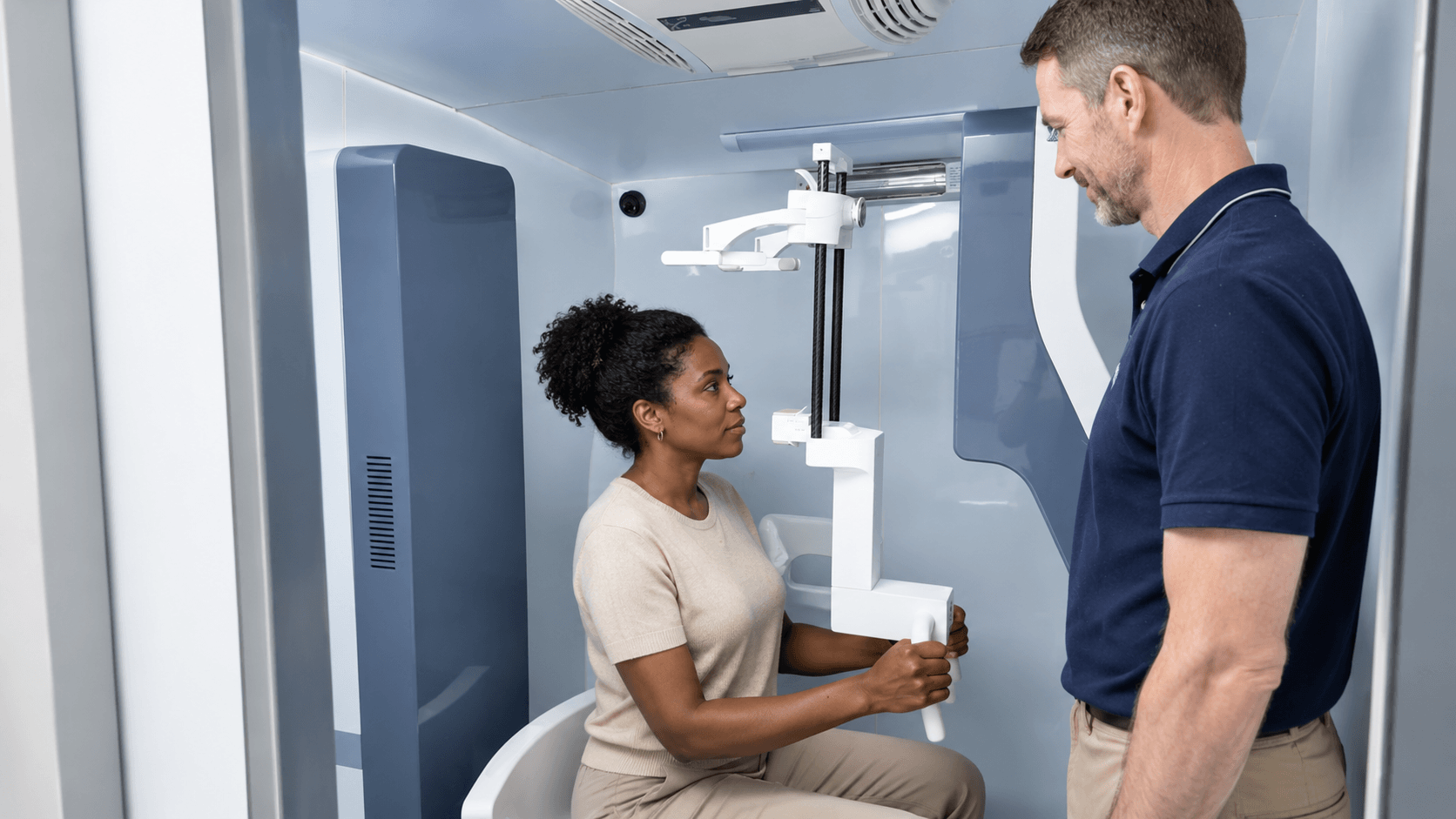 Patient standing in a Pirox mobile imaging vehicle